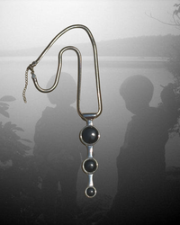 Whispering Orbit Talisman