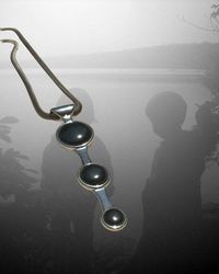 Whispering Orbit Talisman