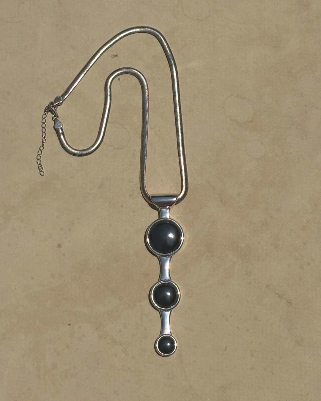 Whispering Orbit Talisman