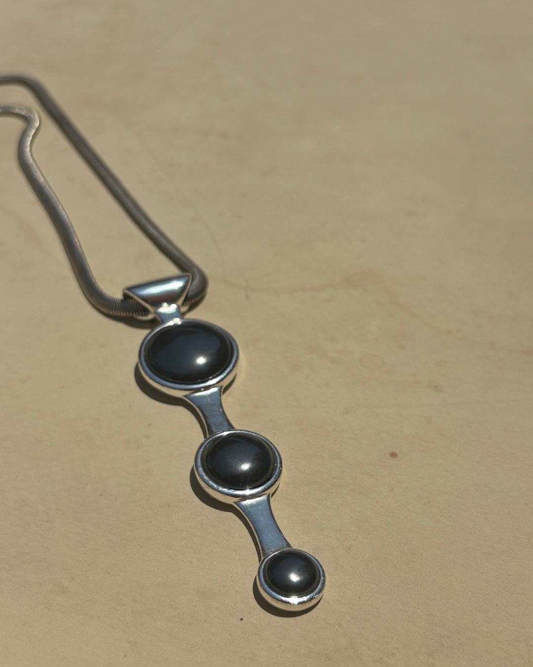 Whispering Orbit Talisman